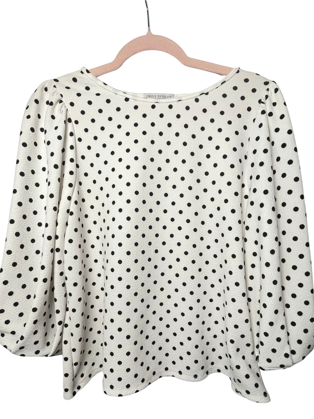 Polka dot coquette blouse with feminine bell sleeves